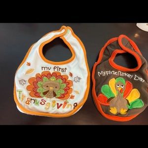 Two “My First Thanksgiving” baby bibs